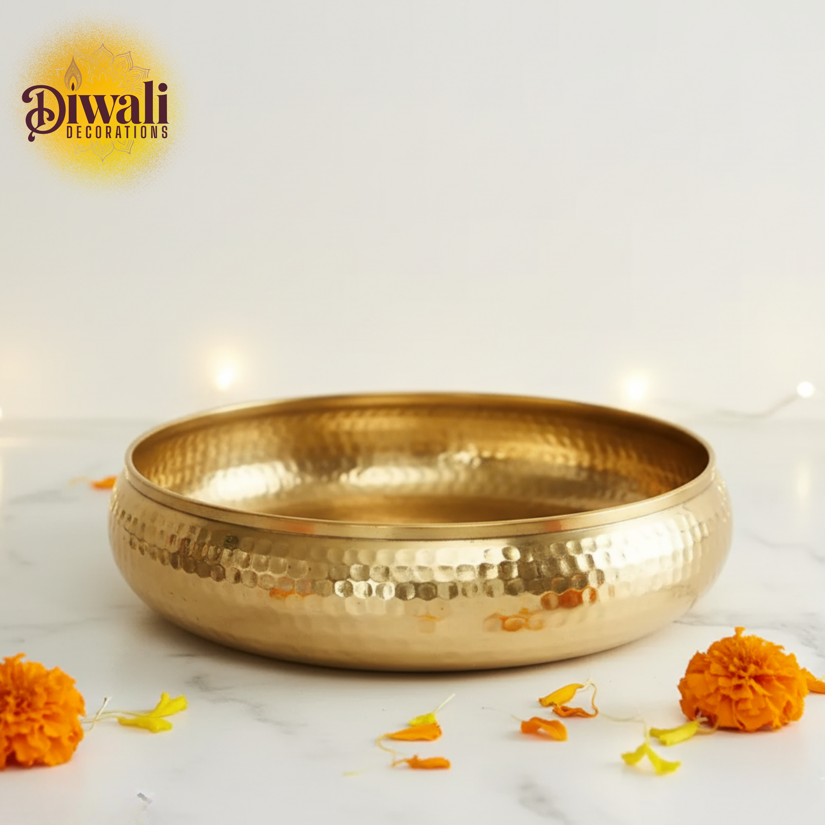 Gold decorative bowl with marigold flowers on a white background, featuring 'Diwali Decorations' text.