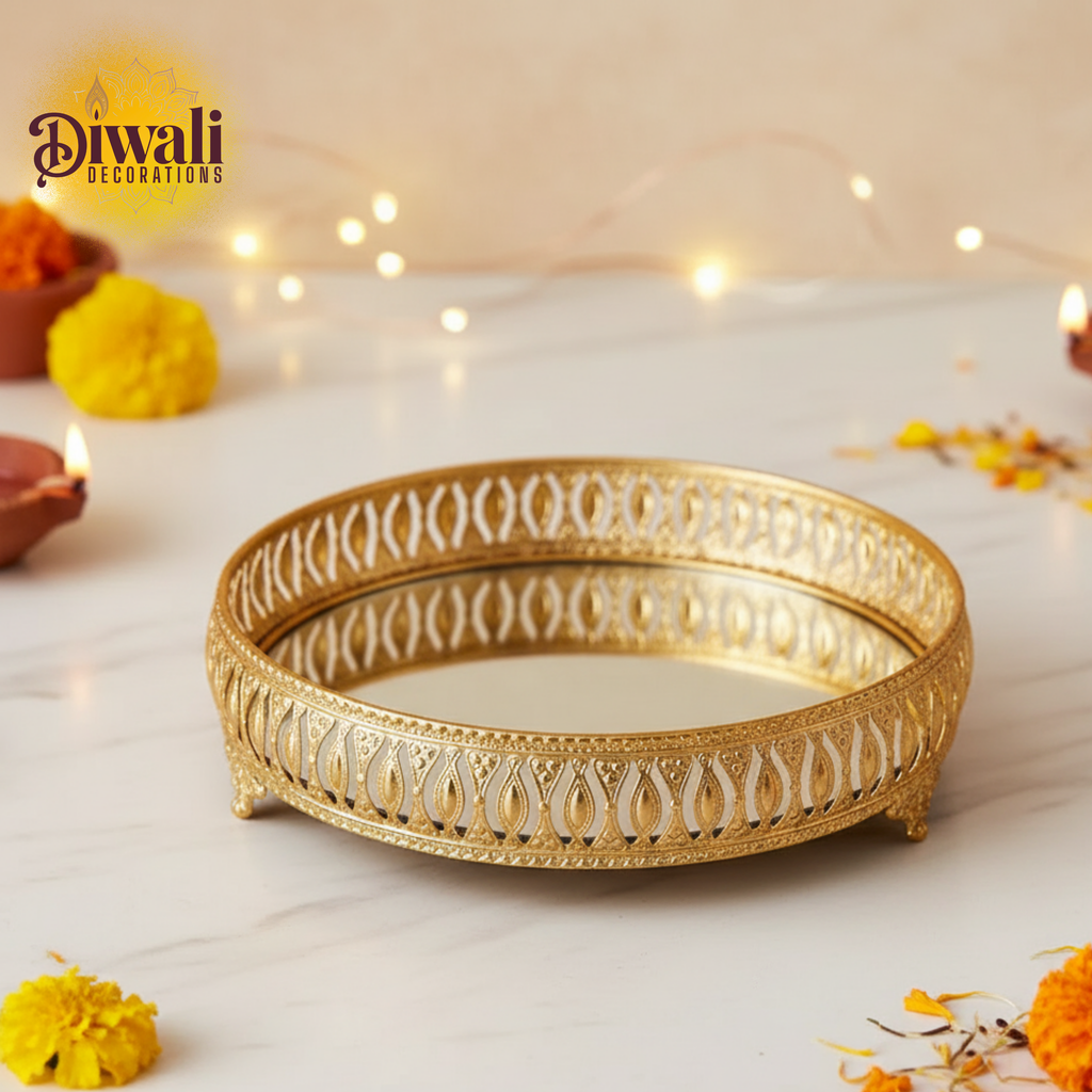 Decorative gold tray on a Diwali-themed background with lights and flowers.