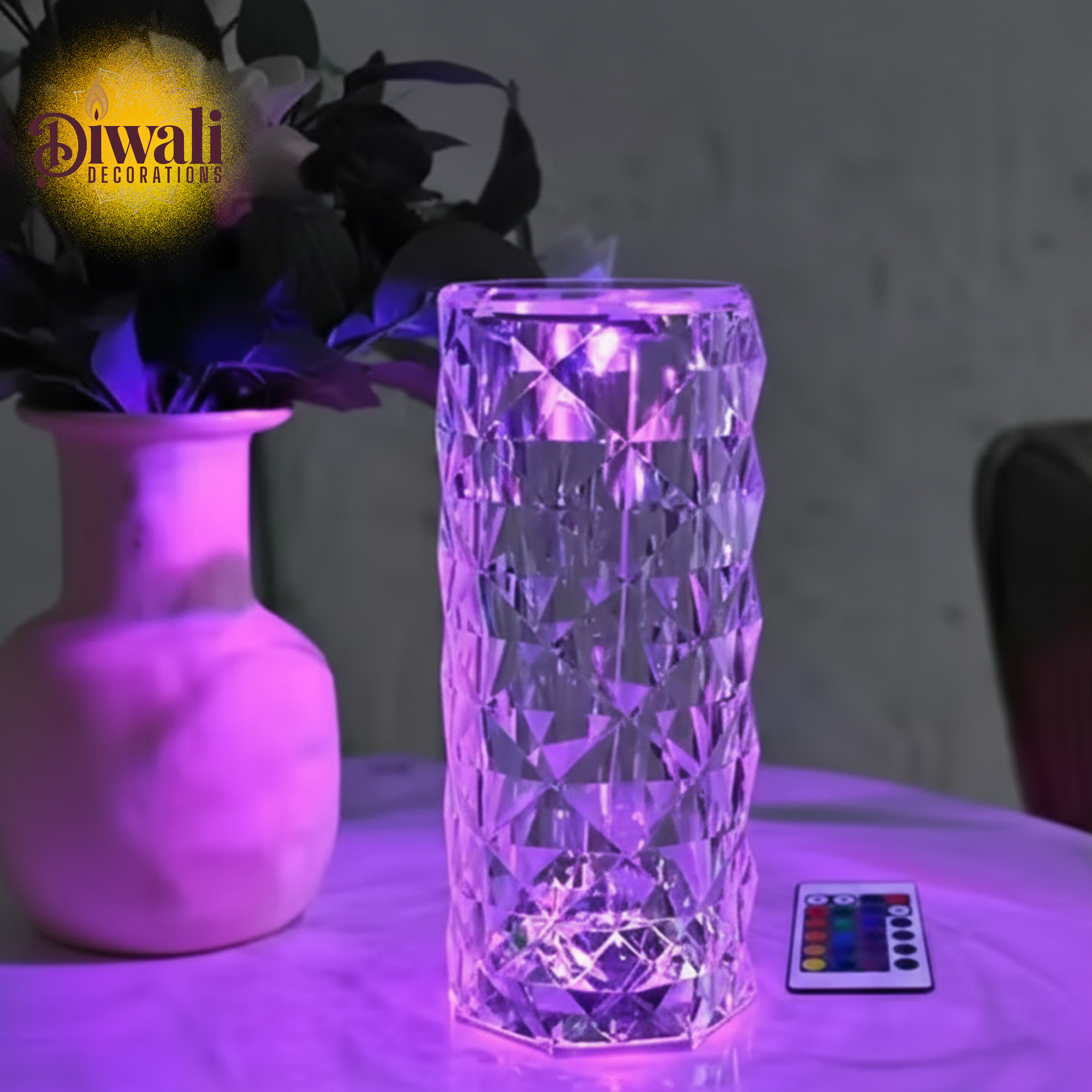 Crystal-like vase with LED lighting and remote control on a table, with 'Diwali Decorations' text.